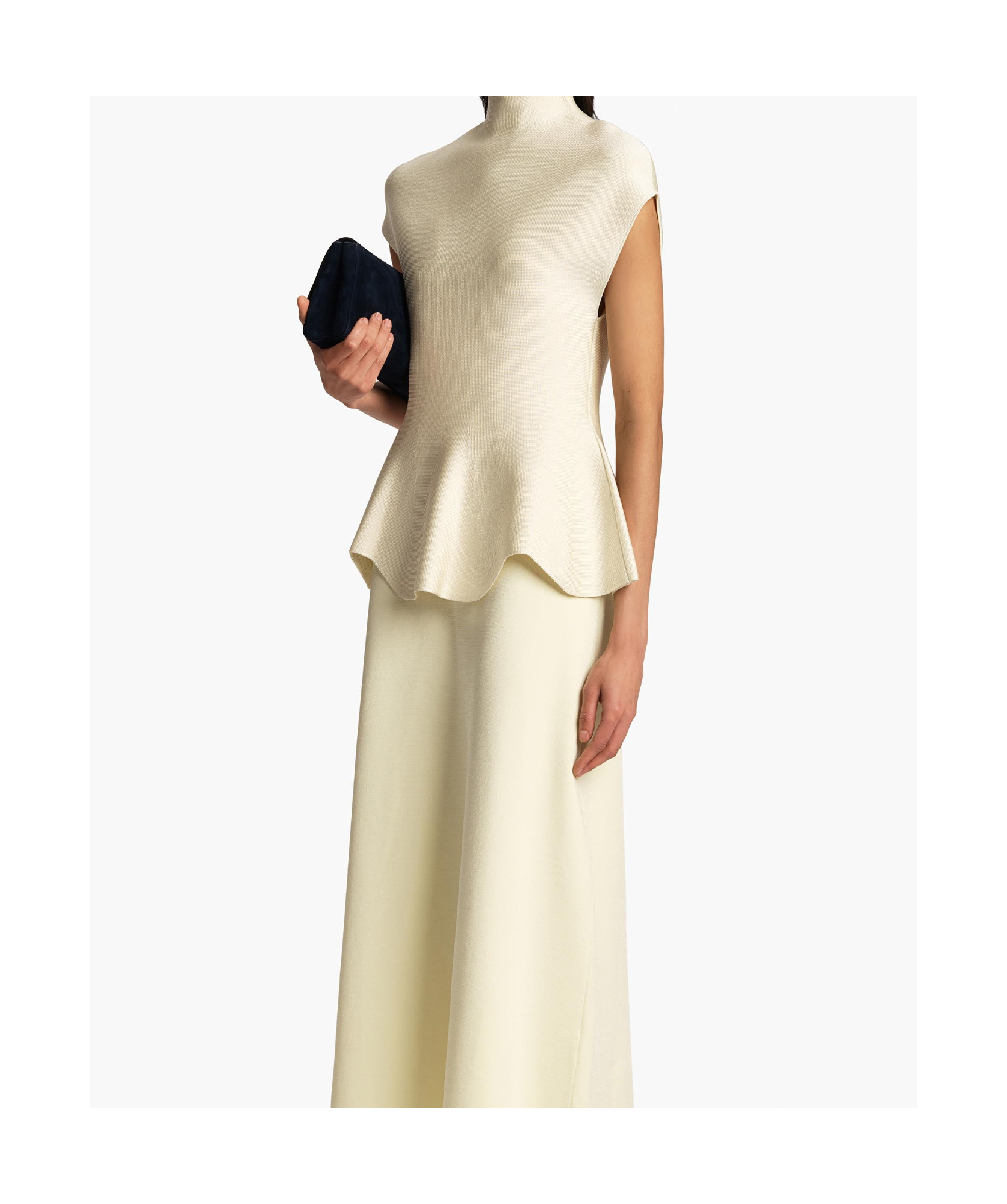 Khaite Andra Knit Peplum Top In Neutral