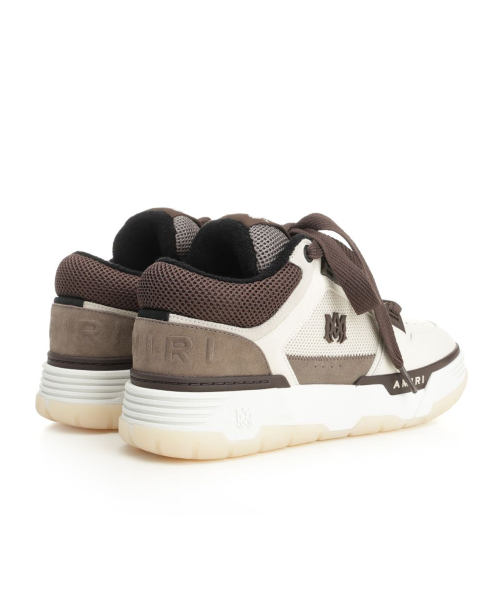 Amiri Brown Low Top Sneakers With Logo Detail On The Side And Mesh Panels In Brown