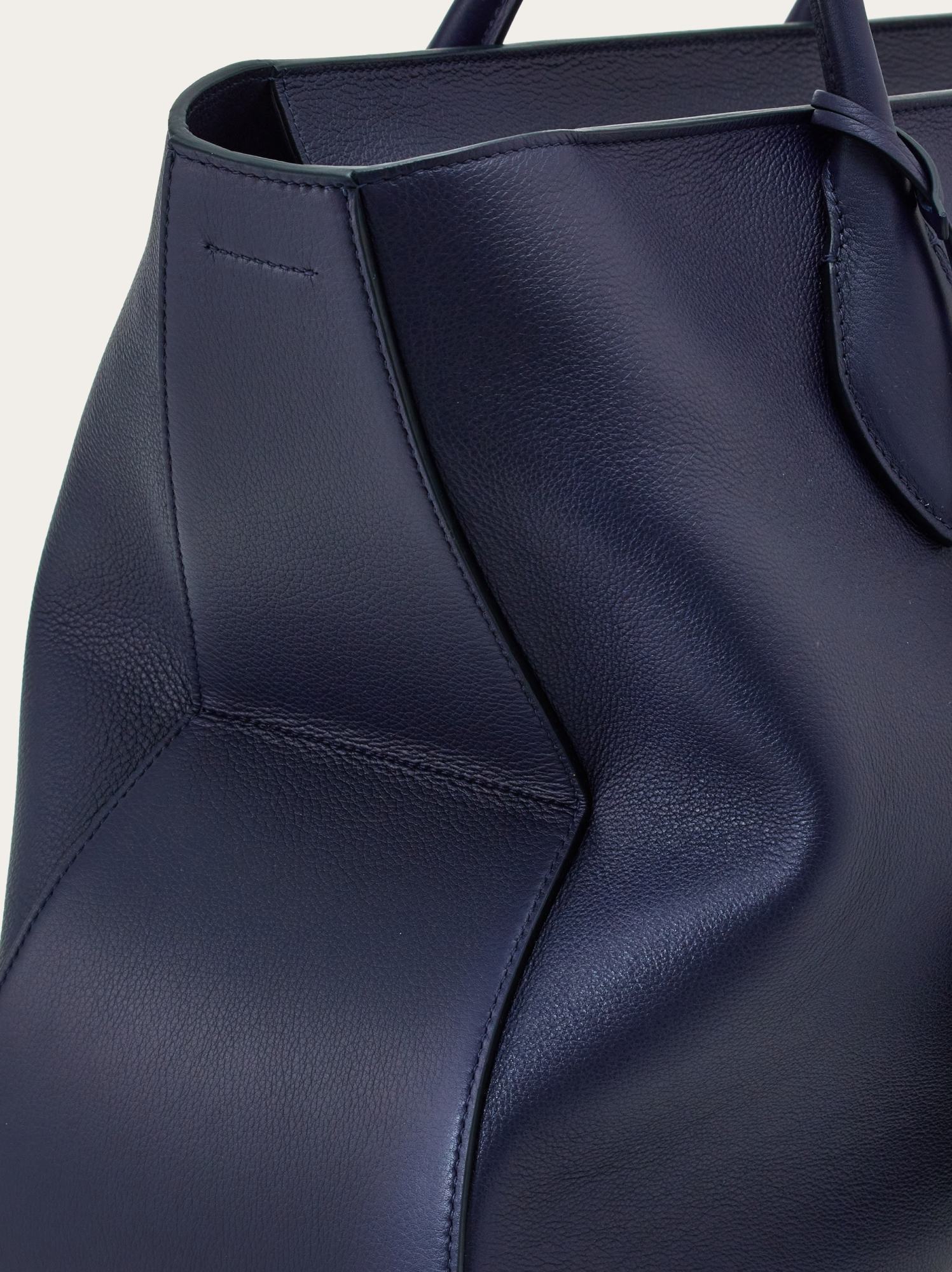 Shop Ferragamo Logo Shoulder Bag In Black