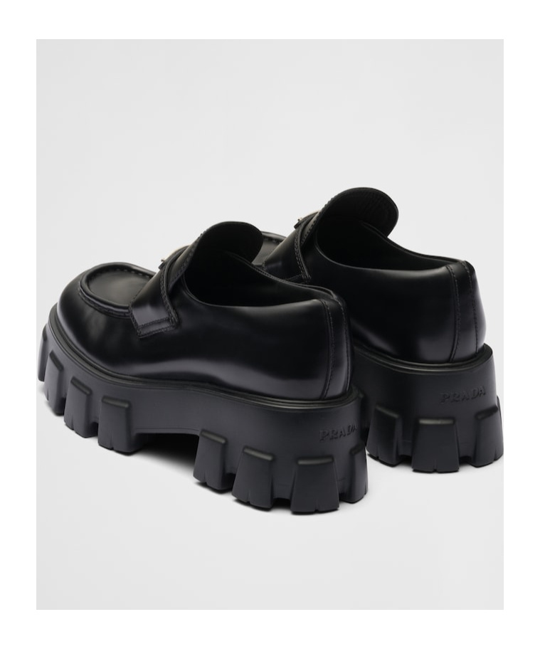 Shop Prada Brushed Leather Monolith Loafers In Black