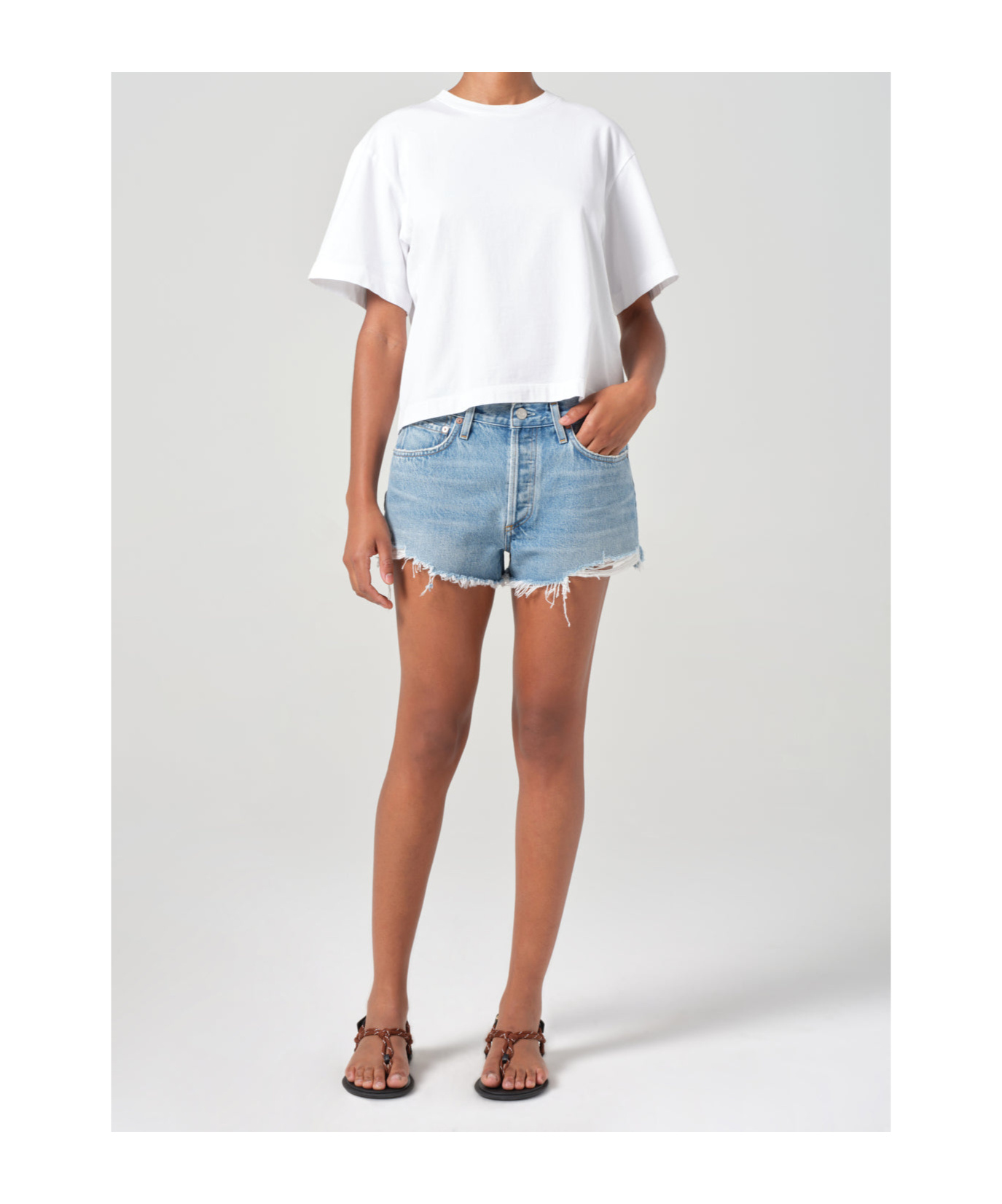 Shop Agolde Ripped Denim Shorts