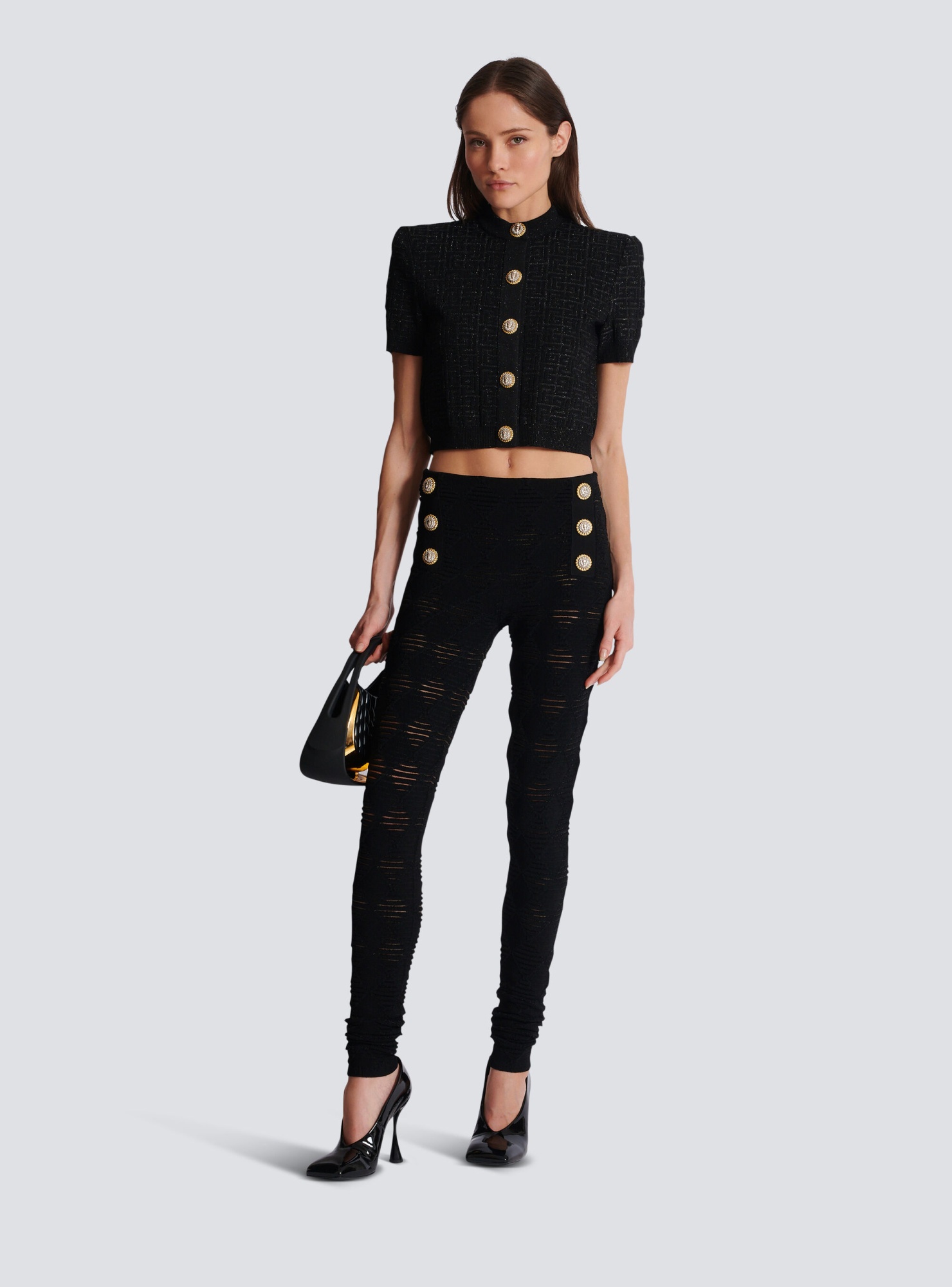 Balmain Embossed-button Open-knit Leggings In Black