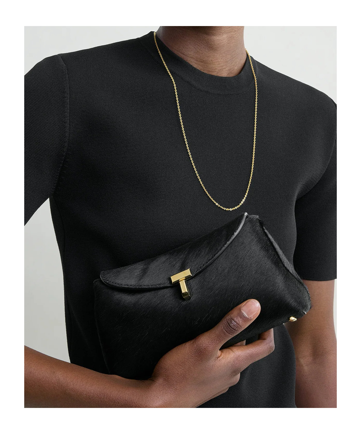 Totême Pony Hair T-lock Clutch In Black