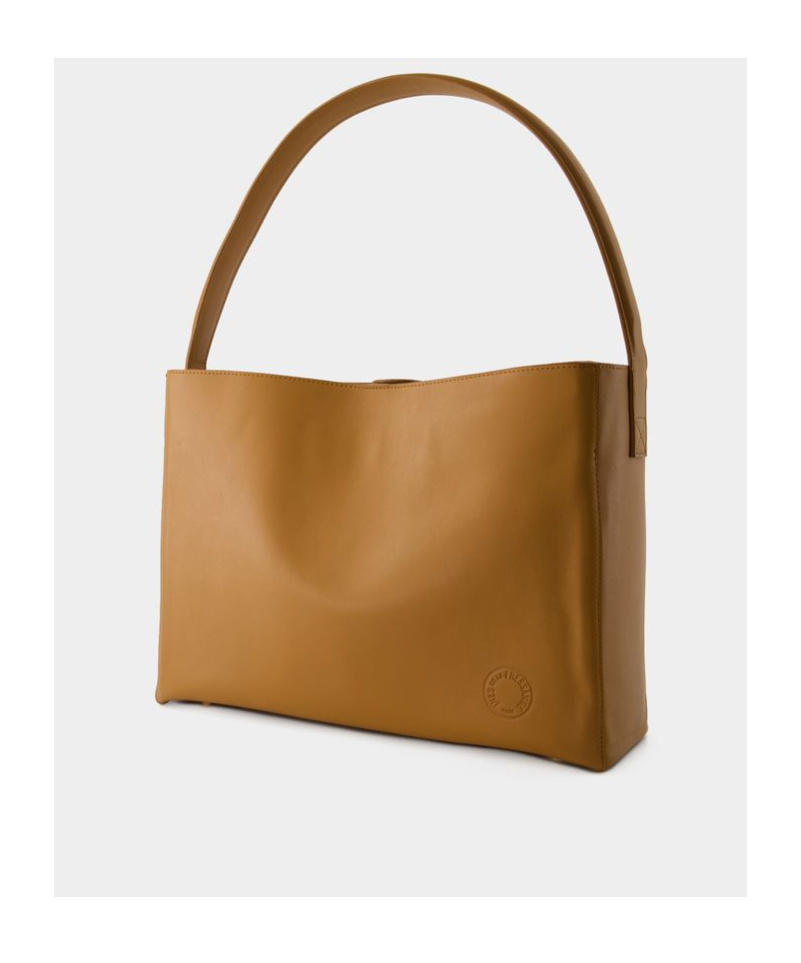 Ines De La Fressange Logo Shoulder Bag In Brown
