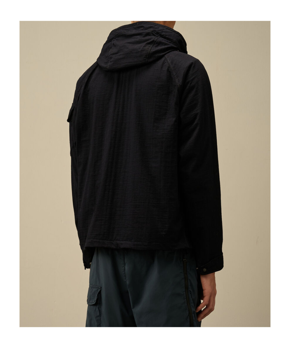 C.p. Company Blue Jacket With Explorer Hood And Adjustable Drawstring Waist In Tech Fabric Man In Black