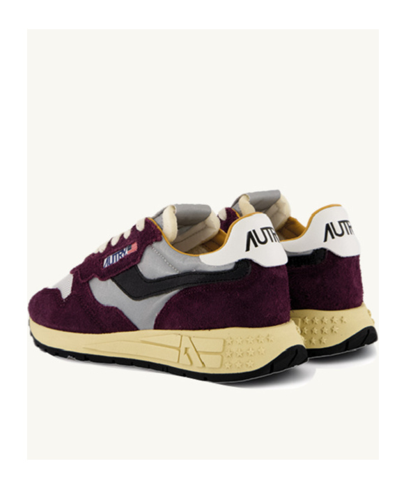 Shop Autry Laced Sneakers In Black