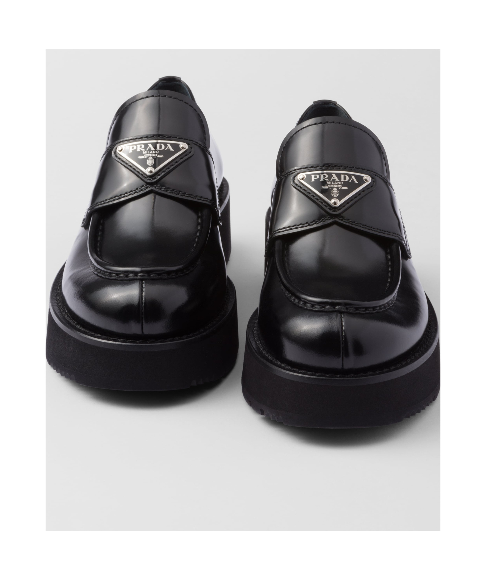 Prada Triangle-logo Leather Loafers In Black