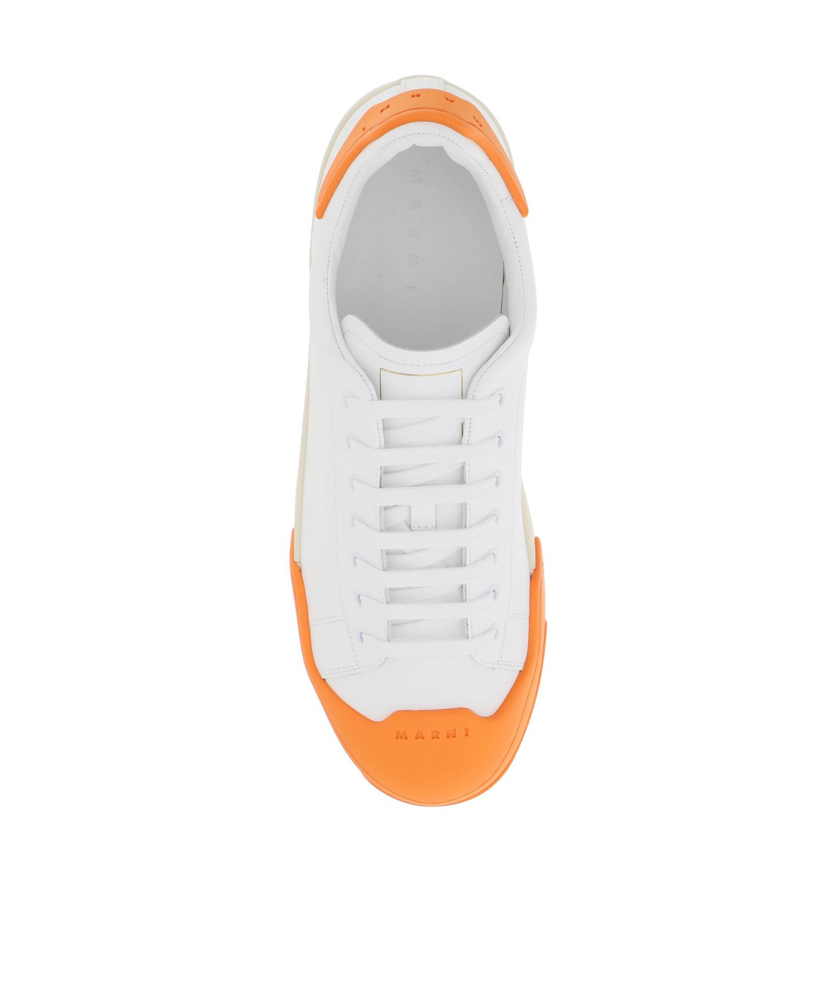 Shop Marni Logo Debossed Low-top Sneakers In White
