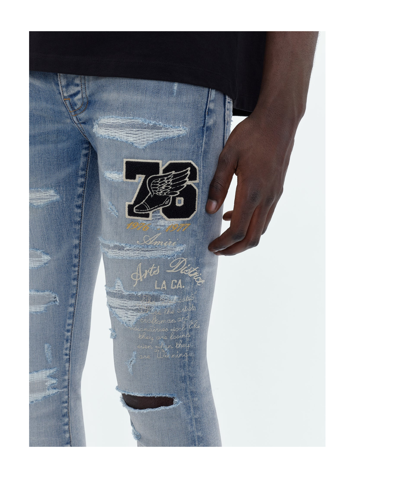 Shop Amiri Logo-appliqué Skinny Jeans In Blue