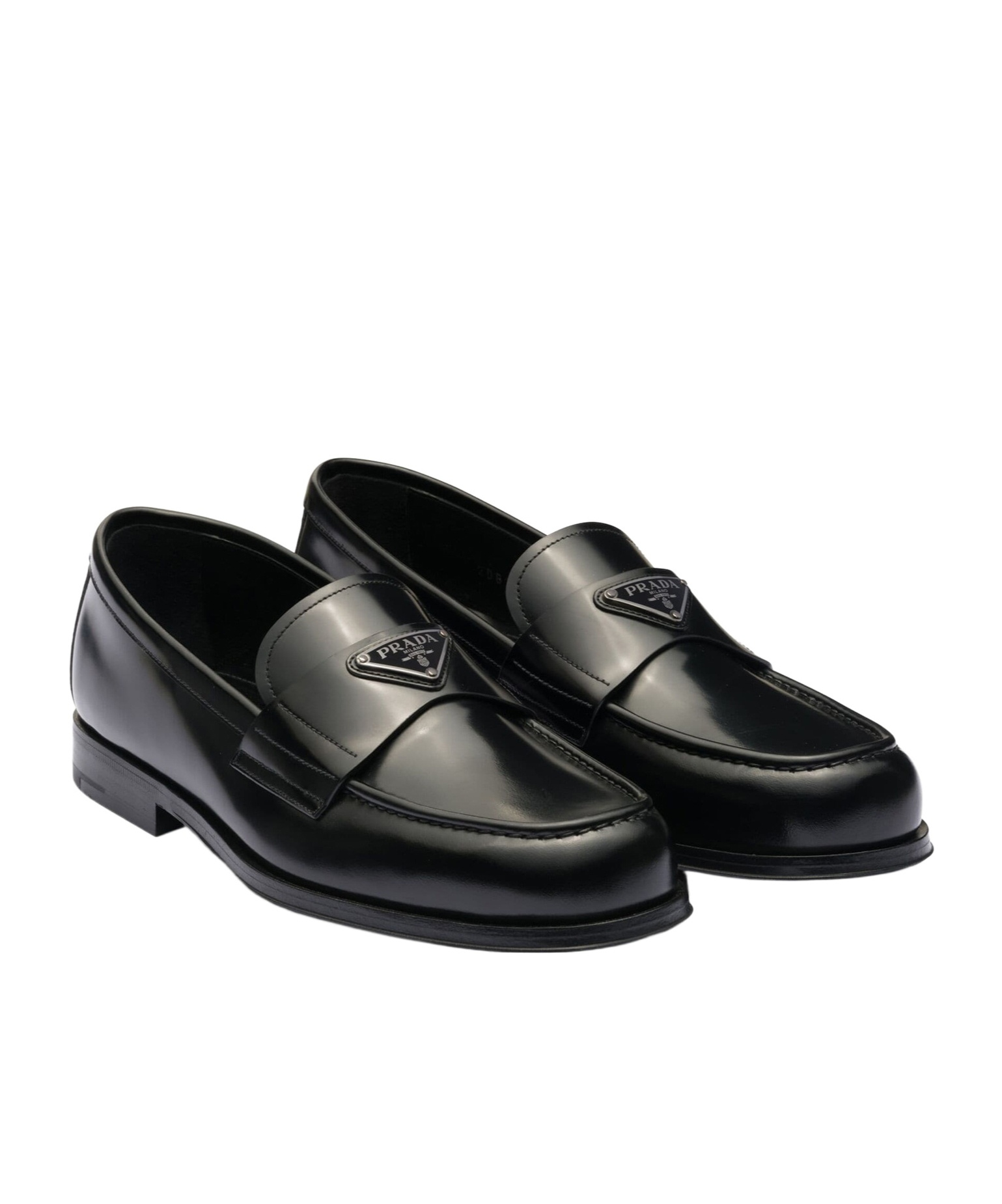 Prada Triangular Plaque Loafers In Black