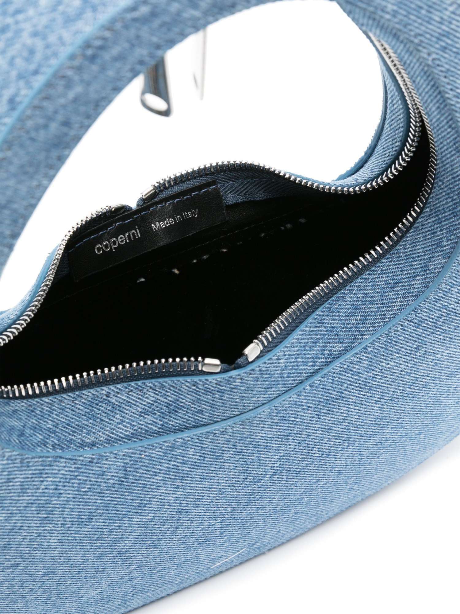 Coperni The Cowboy Is Carrying A Bag. In Blue