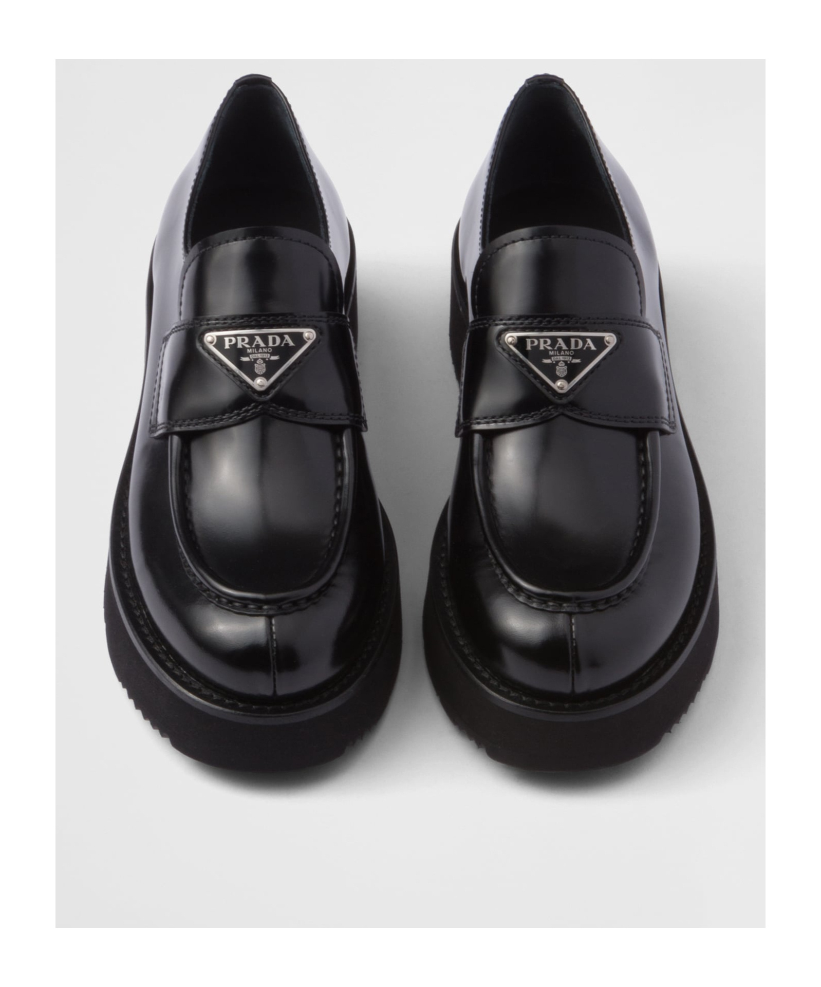 Prada Triangle-logo Leather Loafers In Black