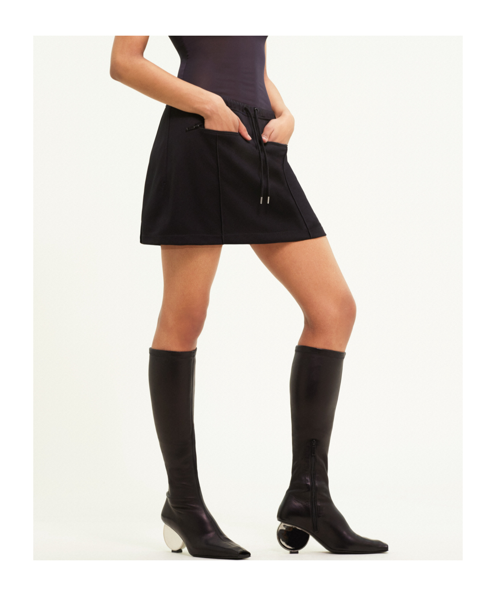 Courrèges Logo-patch Drawstring-waist Miniskirt In Black