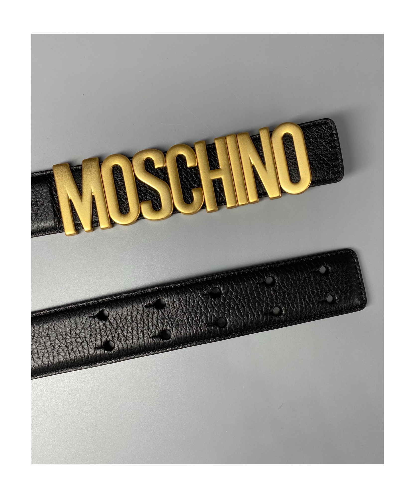 Moschino Adjustable Logo Embossed Belt With Multiple Holes In Black