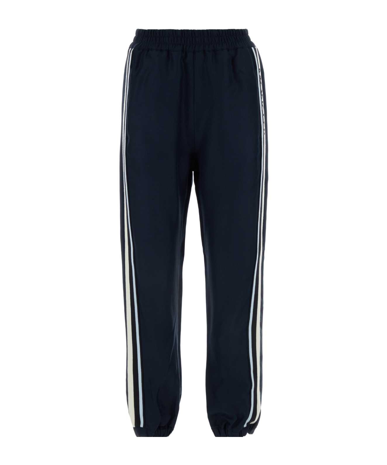 Shop Moncler Logo Embroidered Straight Leg Sweatpants In Blue