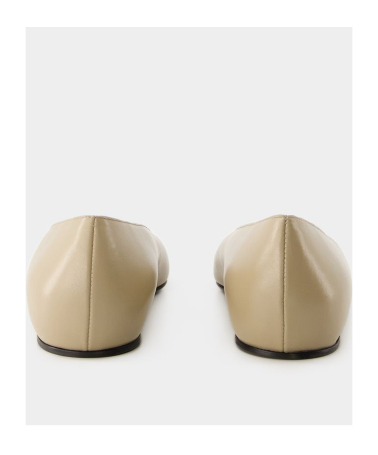 Totême The Asymmetric Ballerina Leather Point-toe Flats In Neutral