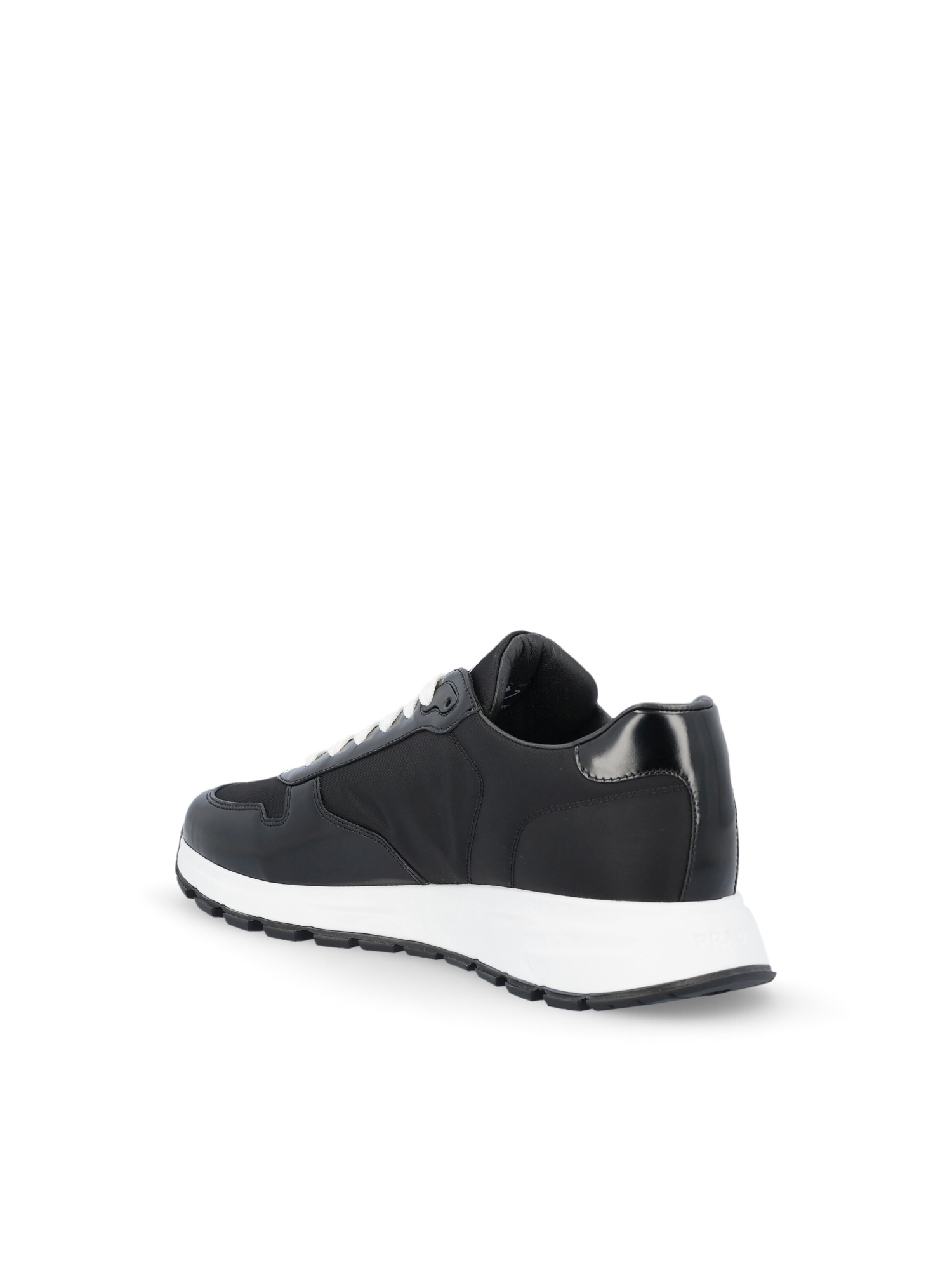 Shop Prada Logo Plaque Low-top Sneakers In Black