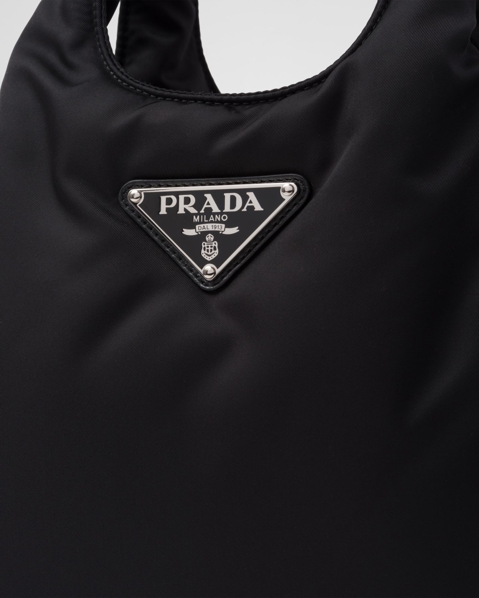 Prada Logo Plaque Padded Mini Tote Bag In Black