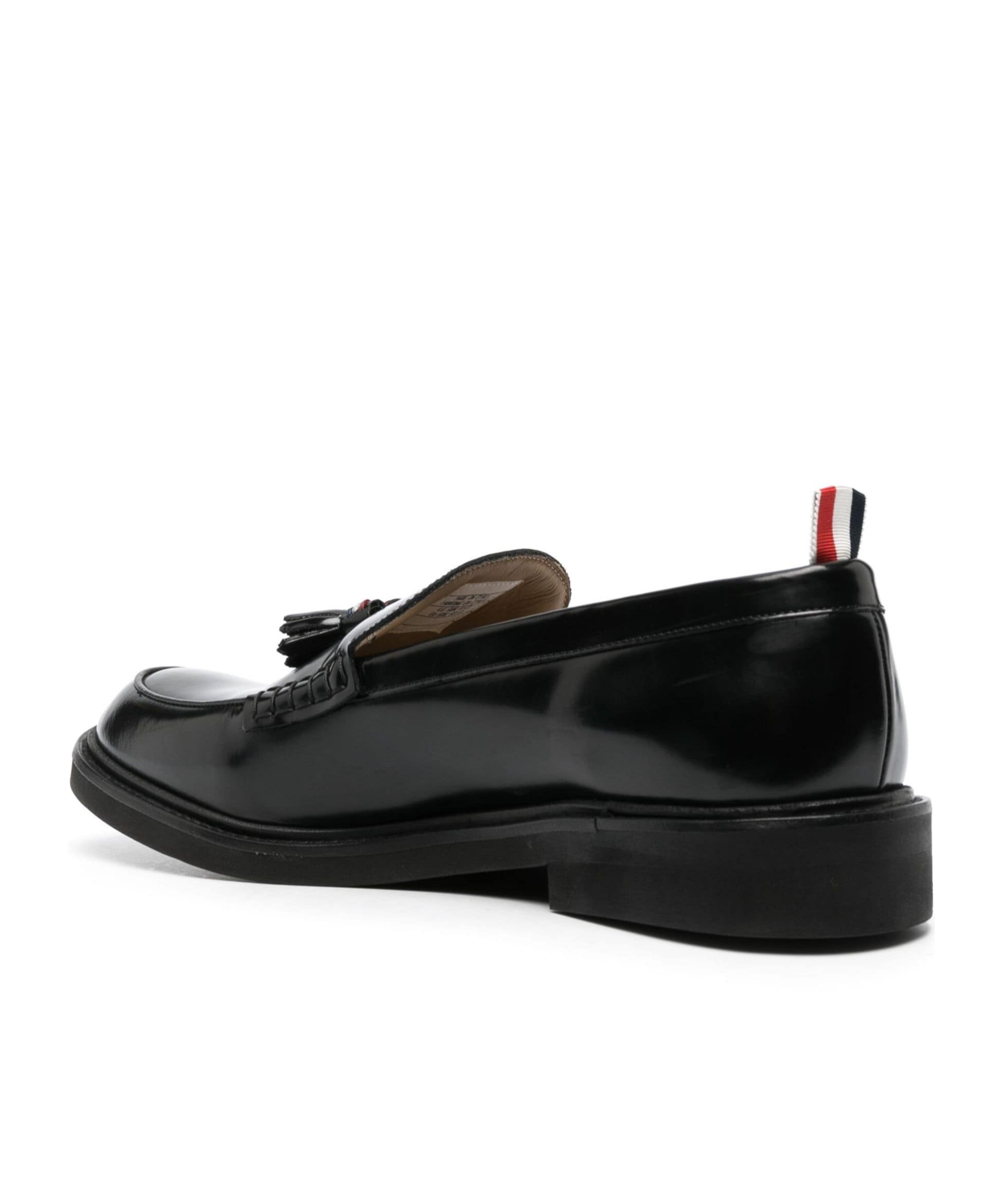 Thom Browne Navy Spazzolato Leather Tassle Loafers In Black