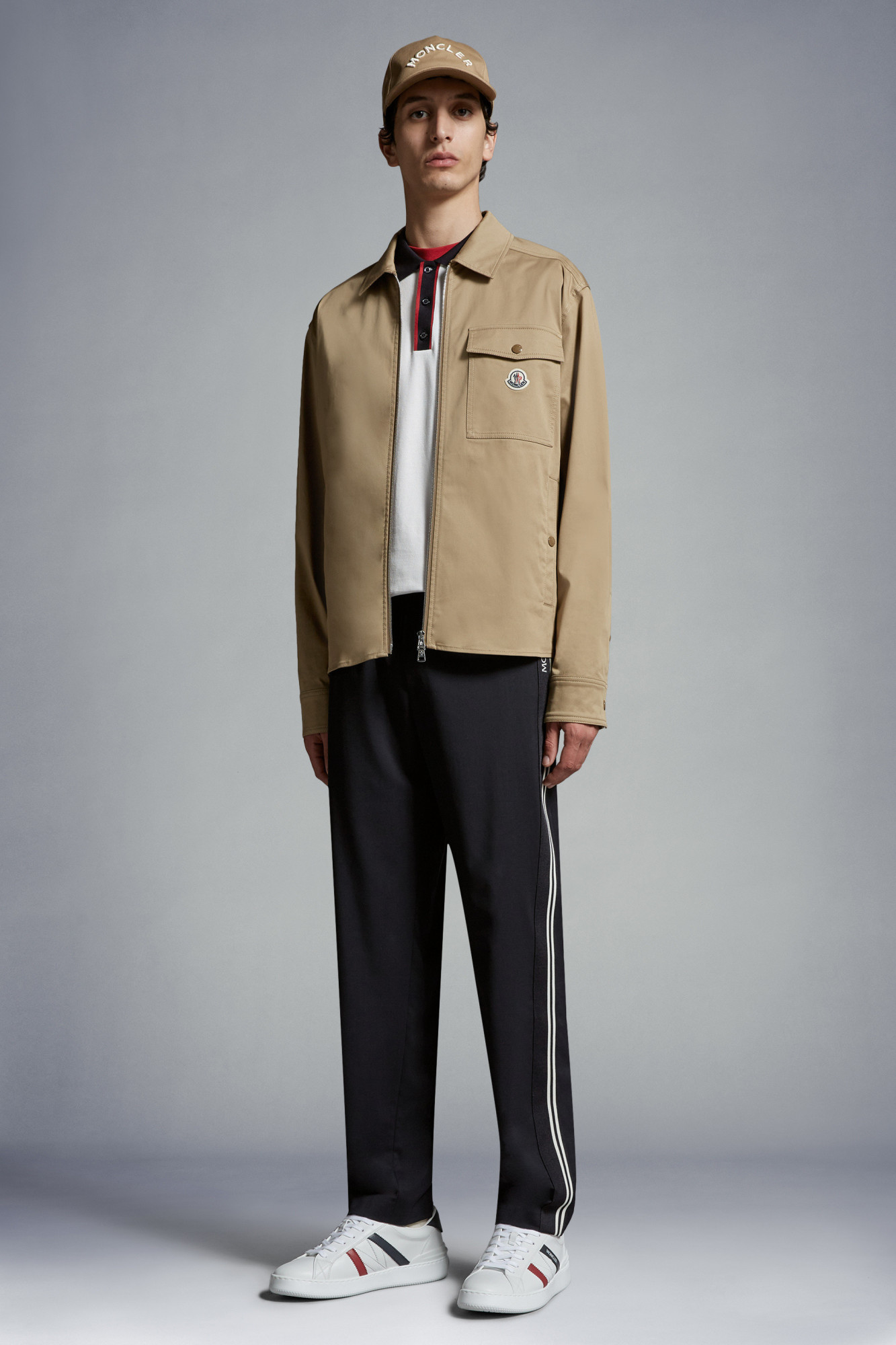 Moncler Logo-embroidered Tapered Trousers In Black