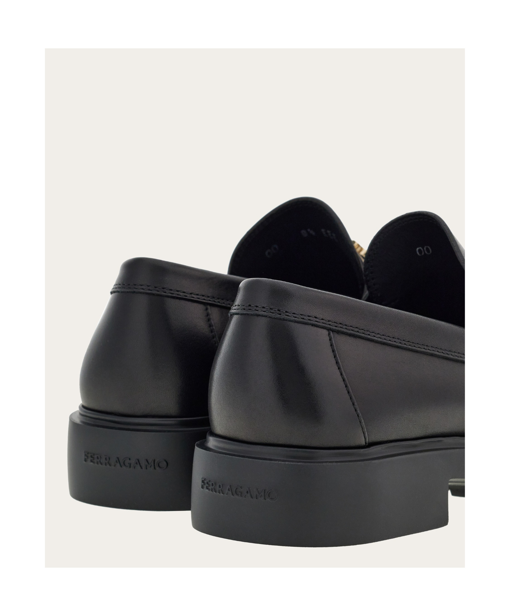 Ferragamo Leather Loafer With Gancini Metal Detail In Black