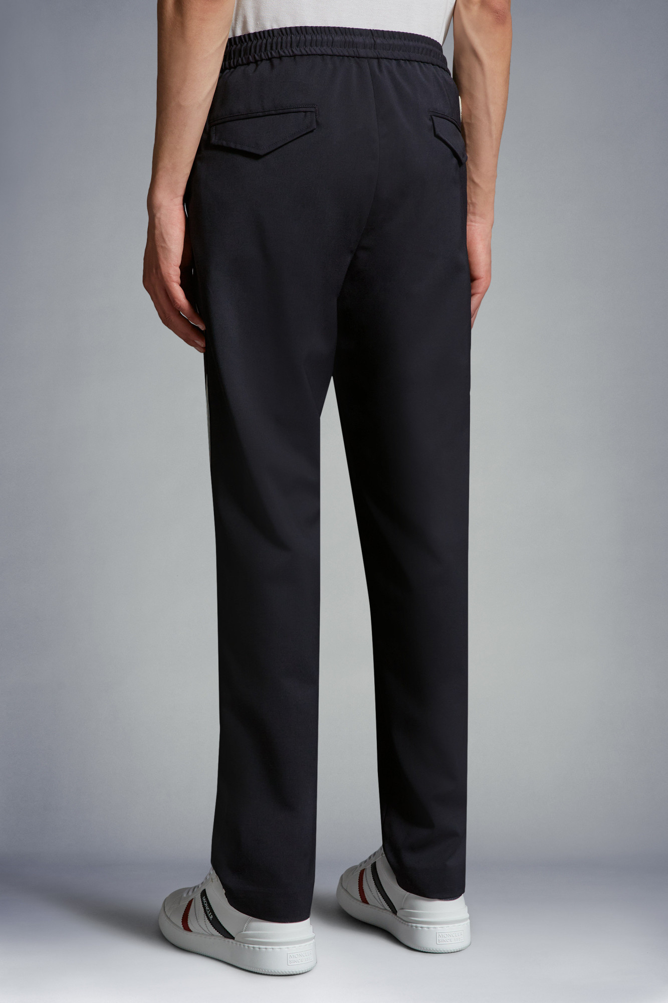 Moncler Logo-embroidered Tapered Trousers In Black