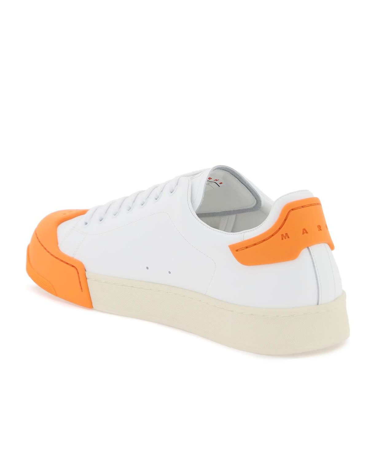 Shop Marni Logo Debossed Low-top Sneakers In White