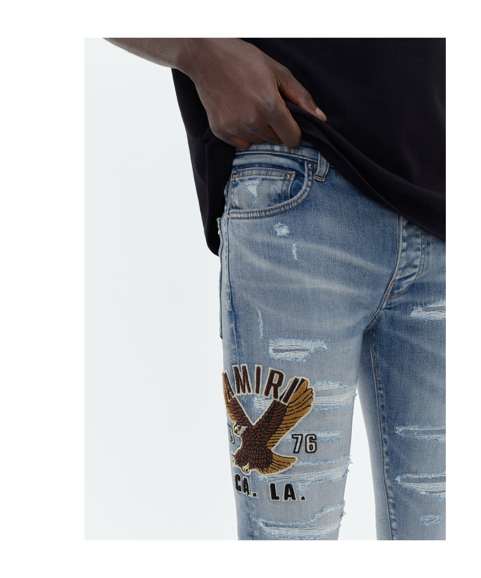 Shop Amiri Logo-appliqué Skinny Jeans In Blue